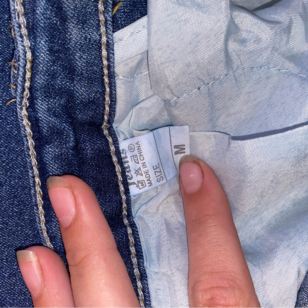 Frayed bell bottom jeans